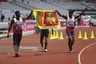 Final Lari 200m T 42/63 bersama atlet Srilanka