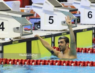 Izadyar Shahin memenangkan 100 Meter Gaya Dada dan mendapat medali emas