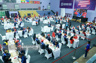 Suasana pertandingan babak penyisihan catur  di   Indonesia Asian Para Games 2018
