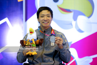 Atlet Anggar Kursi Roda asal Jepang, Fujita Michinobu berhasil meraih medali perak pada nomor Foil kategori B Putra Asian Para Games