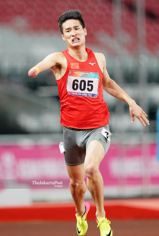 Atlet China Wang Hao memperoleh medali emas dinomor Men's 400M T45/46/47