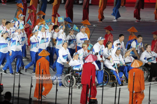 -Defile Atlet Kazakhstan dalam Upacara Pembukaan Asian Para Games 2018