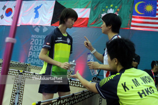 NG MUI WUI MENDAPAT INSTRUKSI DARI PELATIH DALAM LAGA ASIAN PARA GAMES 2018