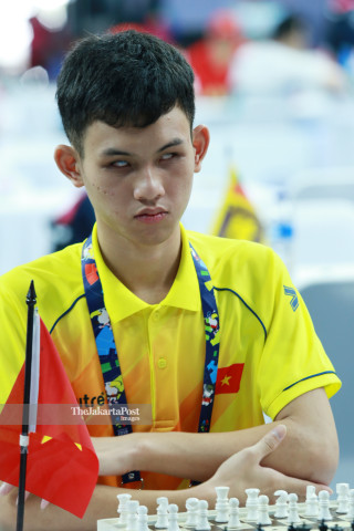 Atlit catur Indonesia Vietnam  Dao Kiet  saat akan bertanding di babak penyisihan catur cepat  ke empat di  ajang Asian Para Games 2018, di Jakarta, Kamis (11/10/2018). INAPGOC/Setiyo Sc